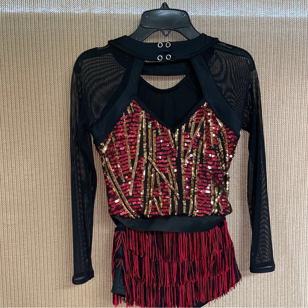 Weissman showtime, size 7-8, red with gold accents.
